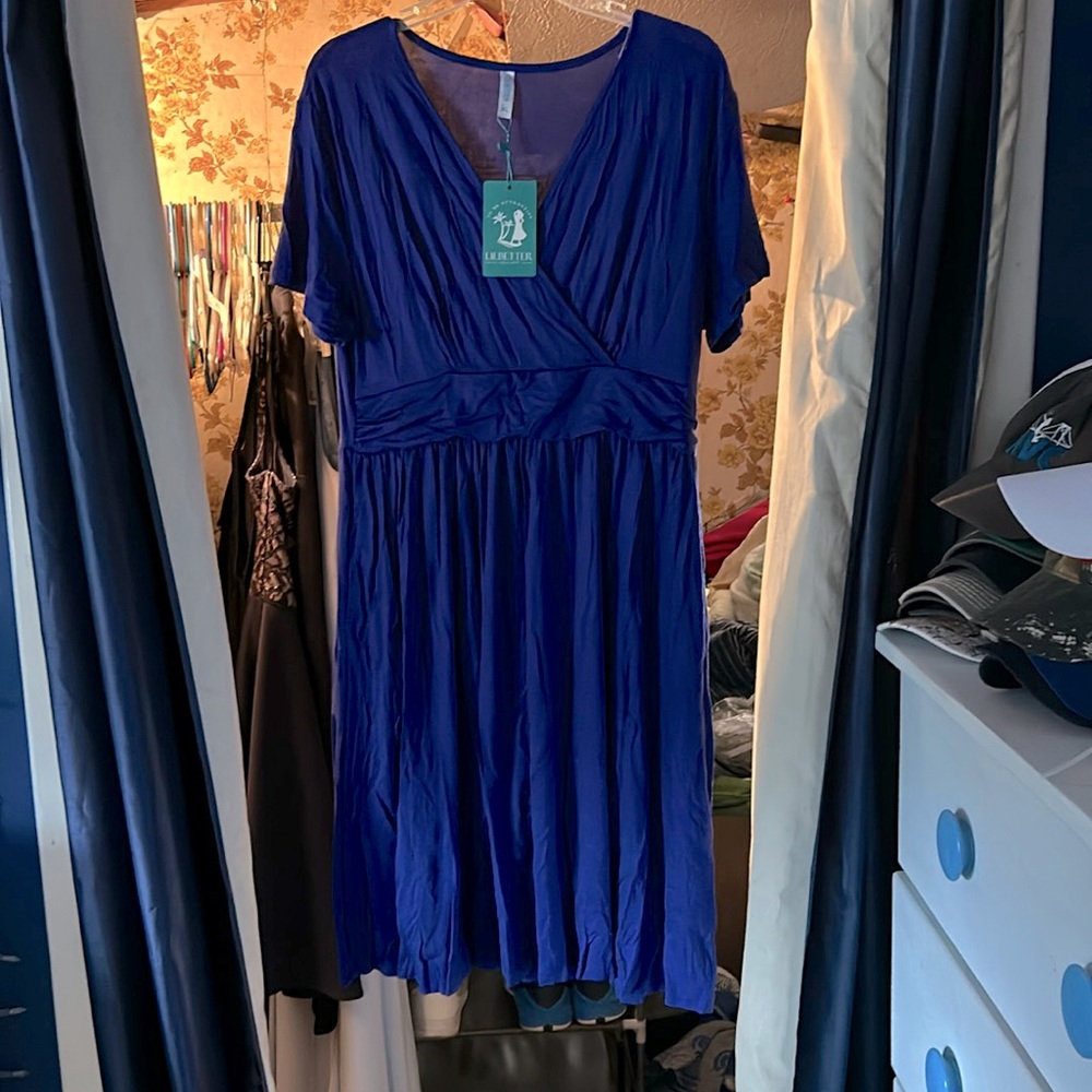 Royal blue, knee length dress.